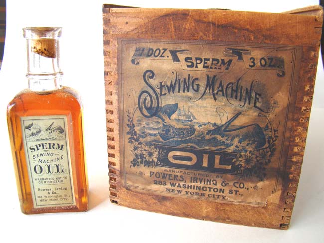 A RARE untouched case of 12 bottles of Sperm Sewing Machine Oil circa 1890-1910.
